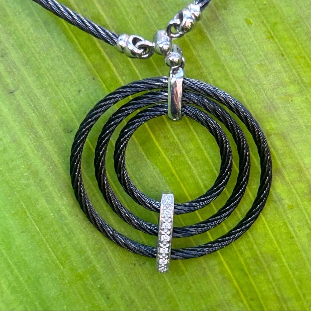 Charriol-Alor Black and 750 gold white , genuine diamonds and stainless steal